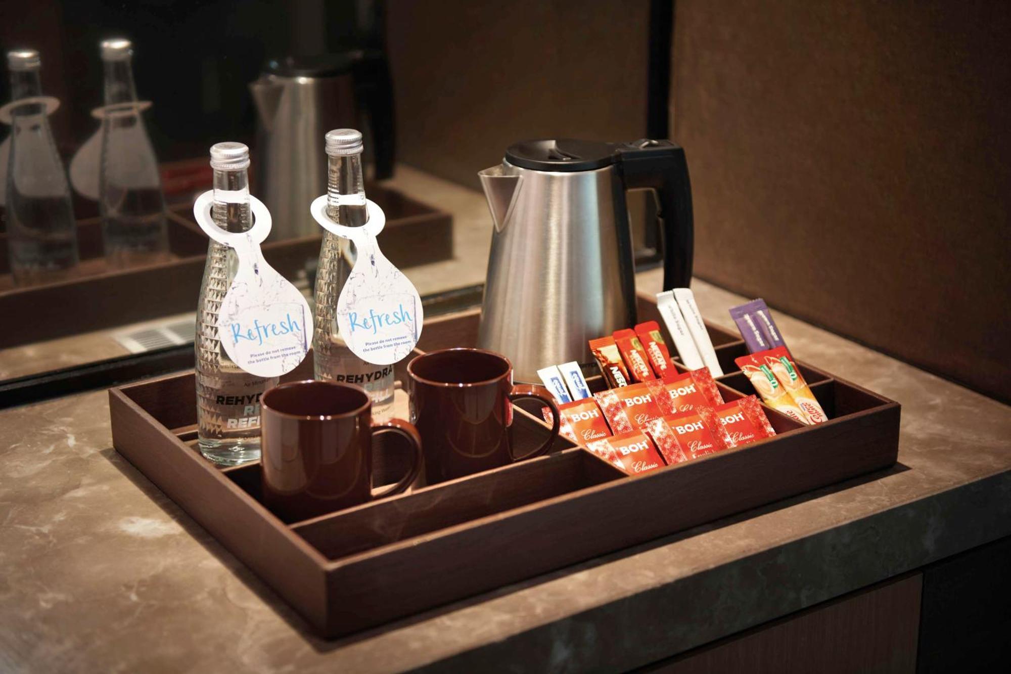 Hotel Doubletree By Hilton Melaka Malacca Esterno foto A hospitality tray